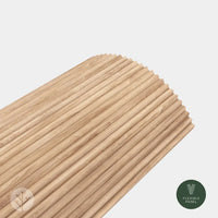 Flutto™ Oak Zigzag flexible wood panel showcasing a unique ridged design, ideal for renovation projects.