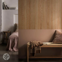 Stylish interior featuring Flutto™ Oak Zigzag flexible tambour wood panels in a modern bedroom design.