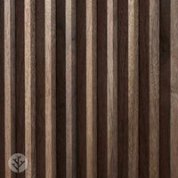 Flutto™ Walnut Zigzag flexible wood panels with a rich walnut finish and pointed ridges, ideal for renovations.
