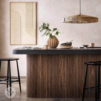 Stylish kitchen featuring Flutto™ walnut slat flexible wood panels, minimal decor, and pendant lighting accent.